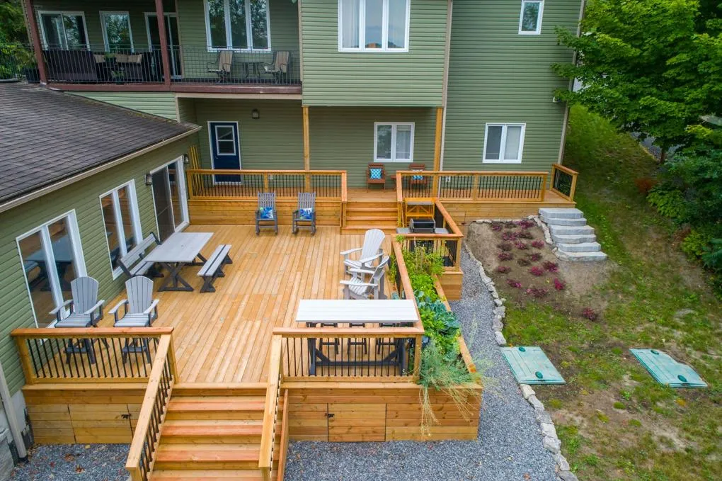 A new natural wood deck in a backyard