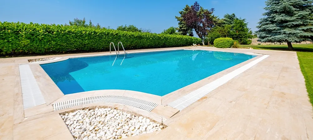 swimming pool in hot summer sun light