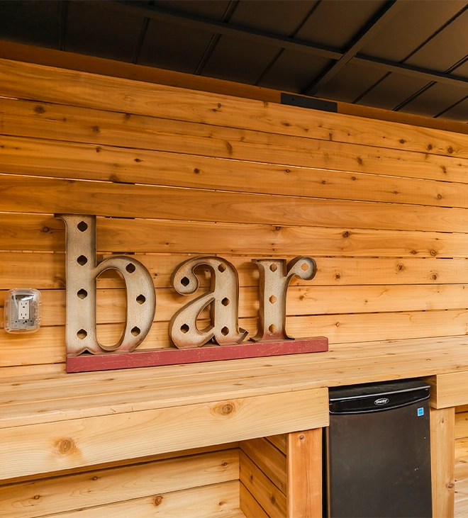 bar writing with lighting feature on wooden wall bar writing with lighting feature on wooden wall