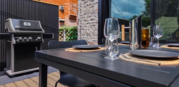 bbq and table chair in open kitchen