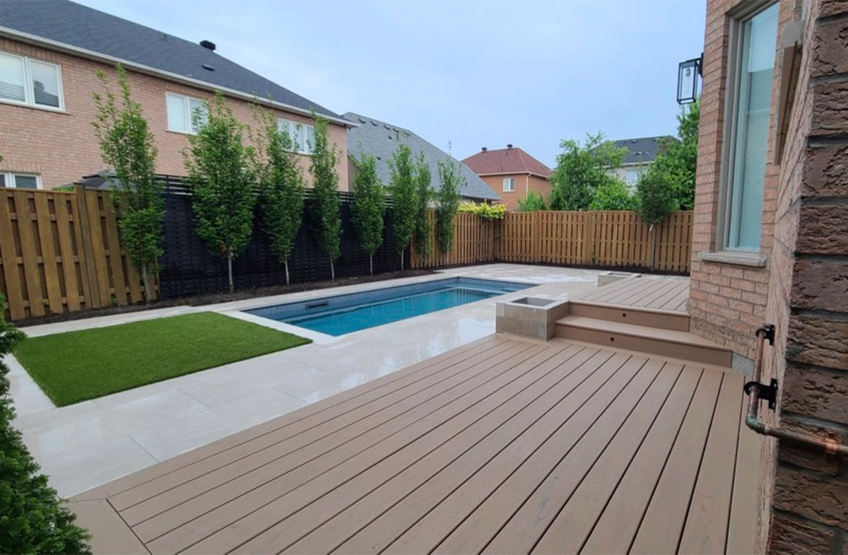 complete yard view, deck, pool, fence, landscaping complete yard view, deck, pool, fence, landscaping