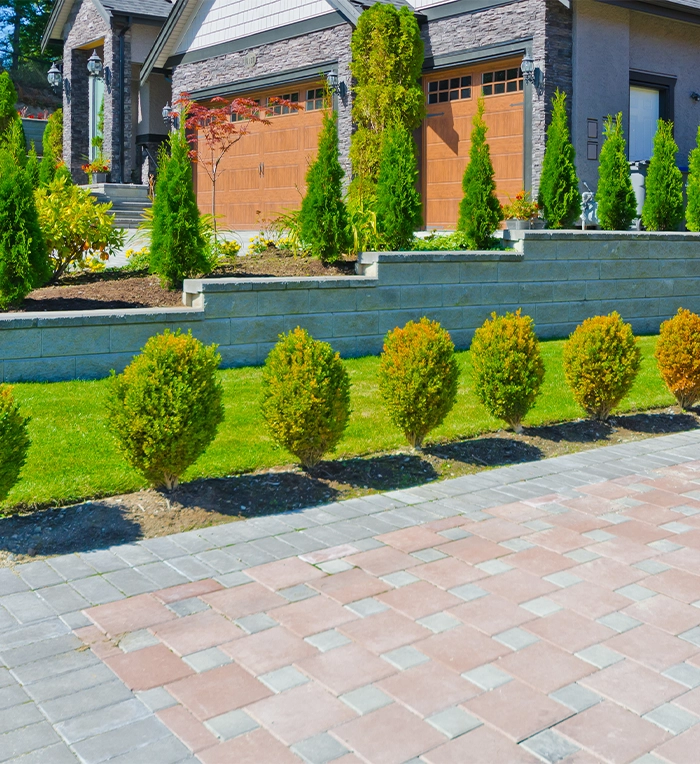 home front driveway, landscaping and retaining wall