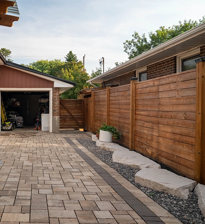 home side entrance walk way and wooden fence