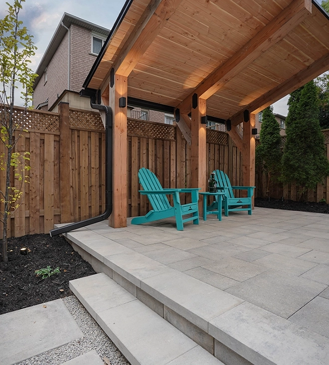 interlock patio and steps, wooden fence, landscaping
