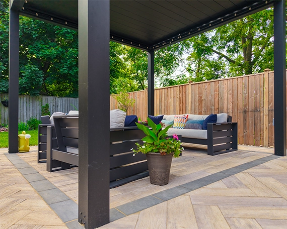 interlocking patio with patio cover and sitting area