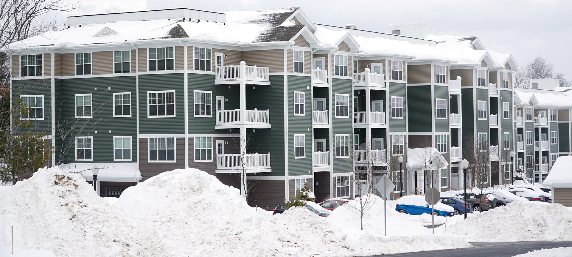 modern apartment building after winter snow storm