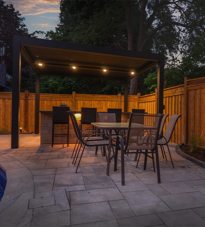 night view of open kitchen and sitting setup with lighting