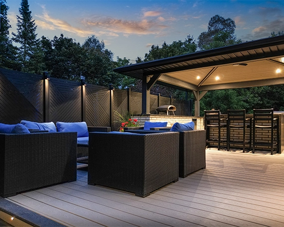 open kitchen with sitting setup and lighting