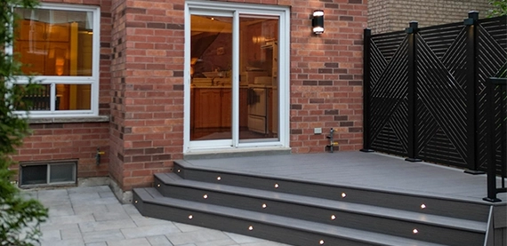 deck with fence at entrance door