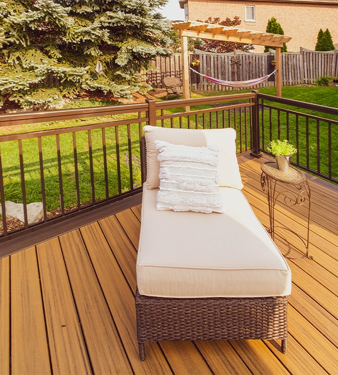 single coach on deck with railing in back lawn single coach on deck with railing in back lawn