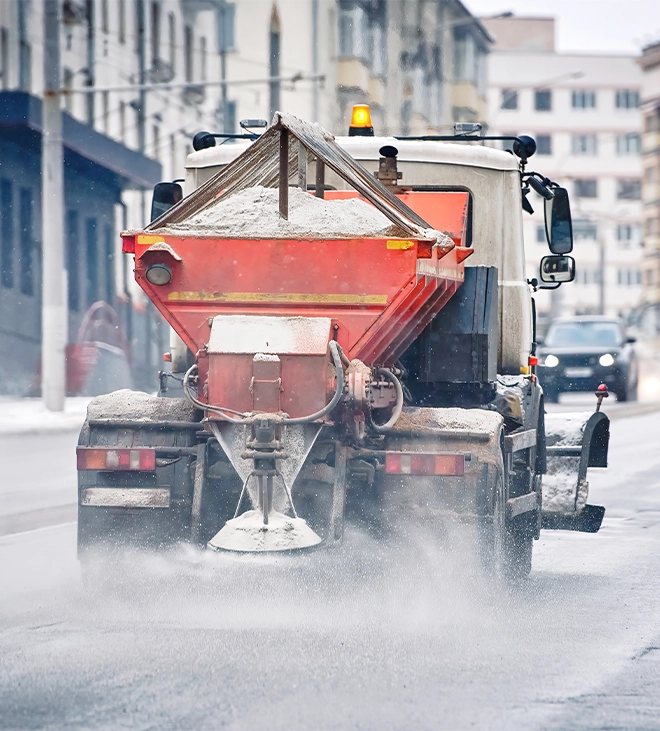 truck salting on road snow for de ice