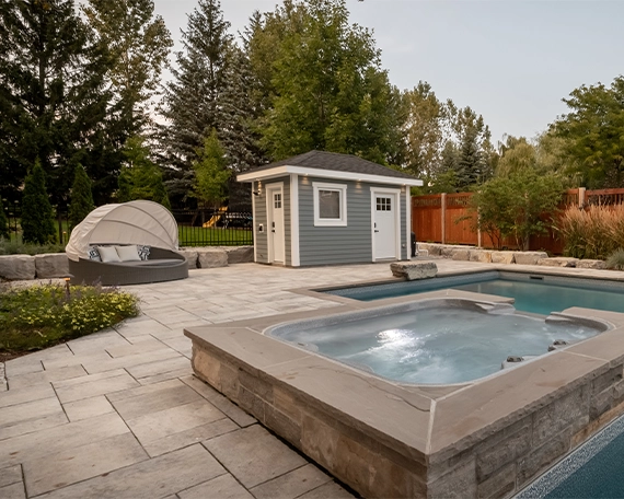 Pool interlock restoration image seven swimming pool with plunge pool and interlock deck in backyard