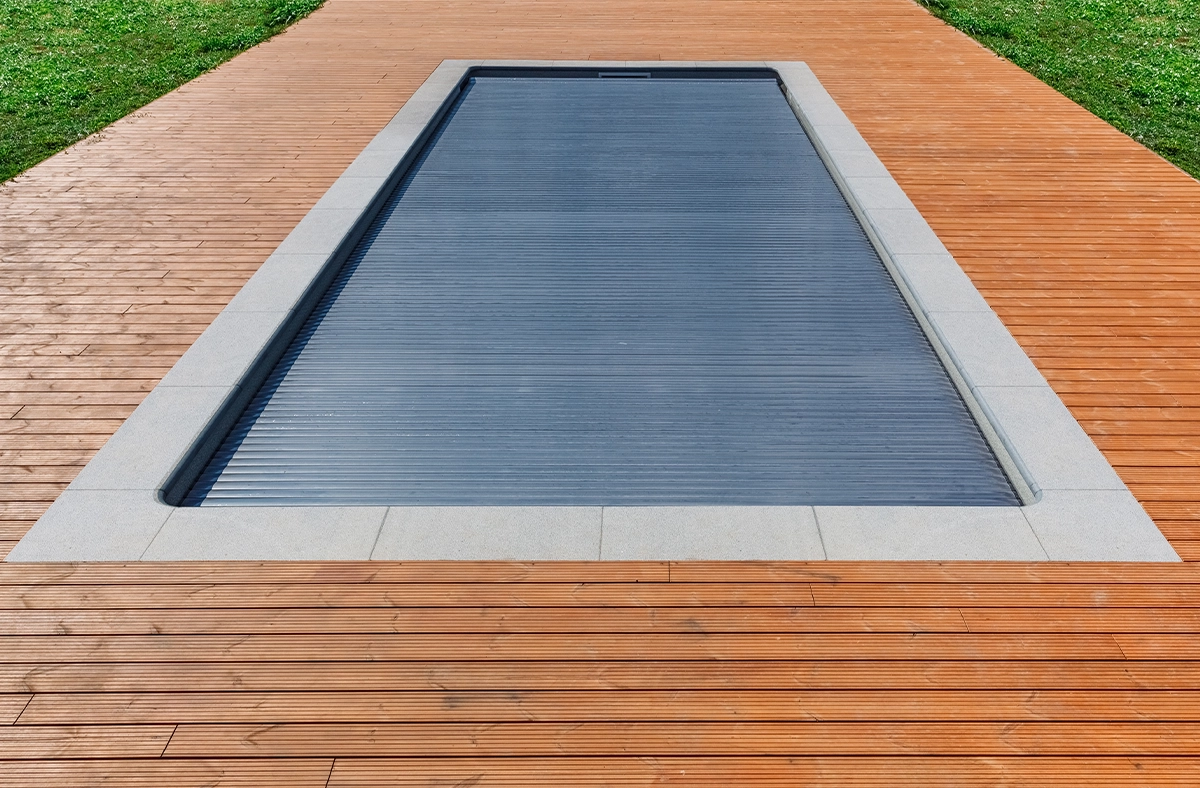 automatic pool cover on swimming pool full covered pool by automatic pool cover and trex pool deck