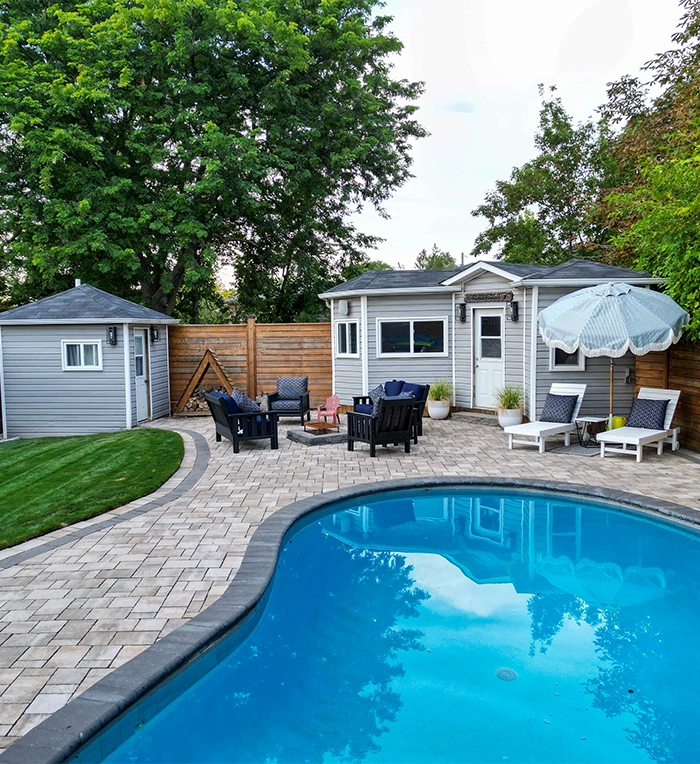 home backyard pool, interlock surface, custom carpentry, sodding and fence
