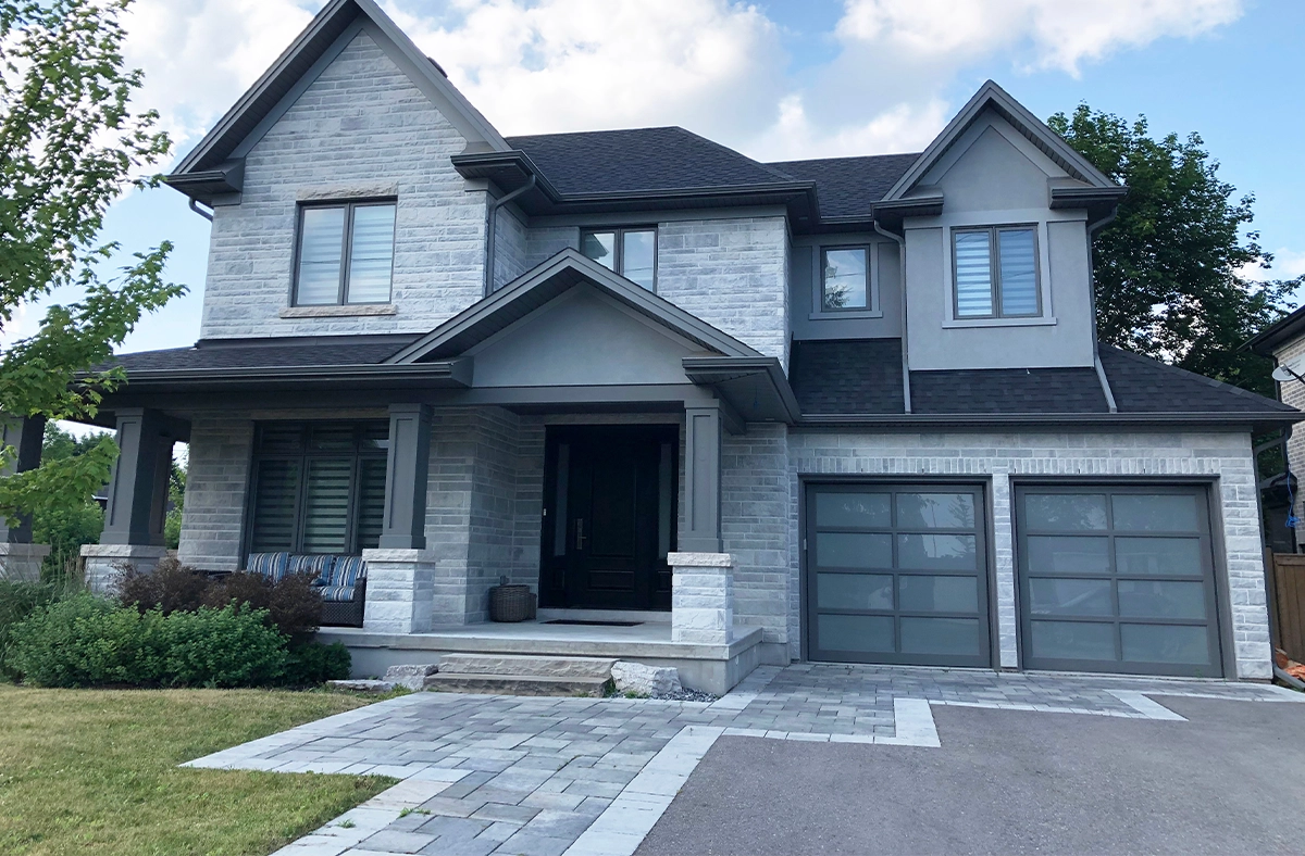 custom design interlocking walkway front of luxury home