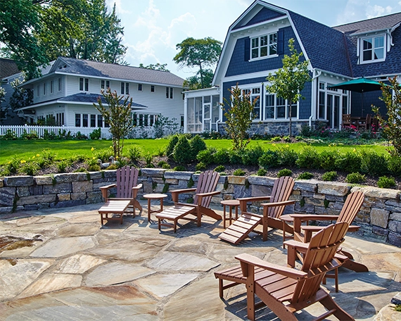 flagstone patio and retaining wall, luxury home backyard