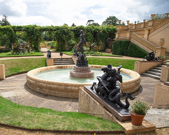 water fountain in centre of walkway in commercial park