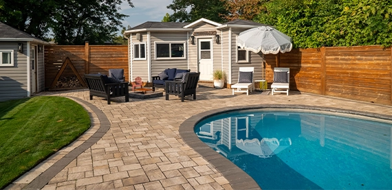 hardscaping image four interlocking patio and surface around pool with sodding