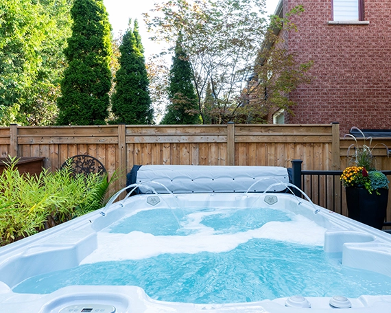 hot tub with waterfall feature