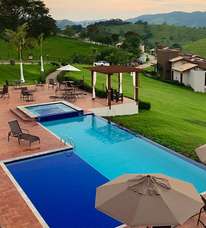 infinity swimming pool in home backyard infinity swimming pool in home backyard, beautiful valley view, full yard setup for gathering