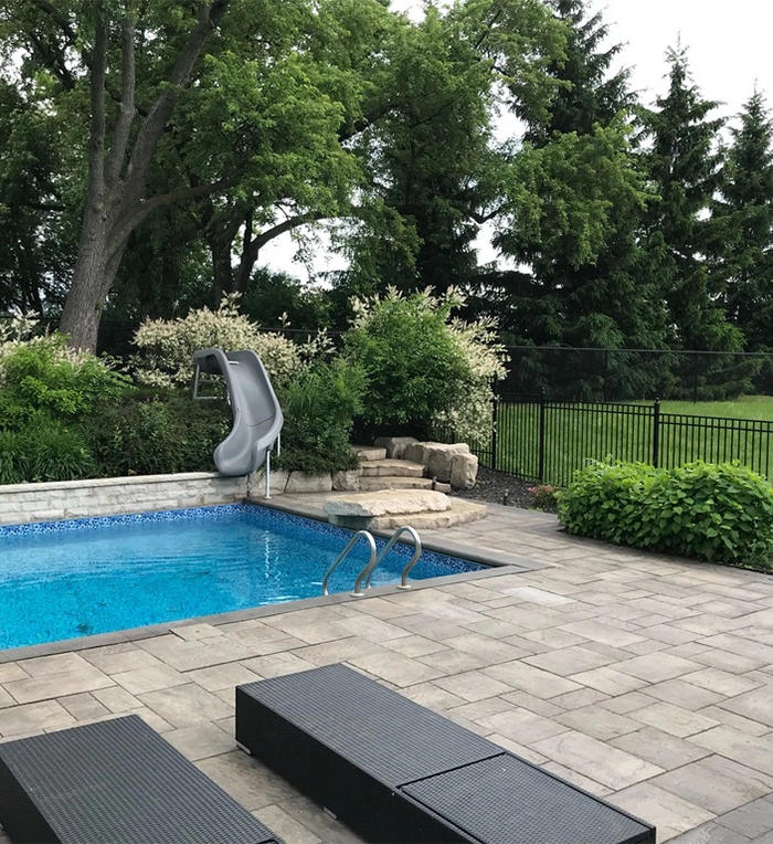 interlocking pool deck in outdoor space and aluminium fence