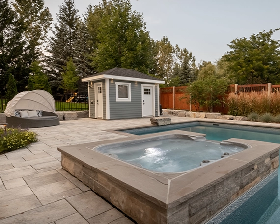 pool with small plunge and interlocking deck