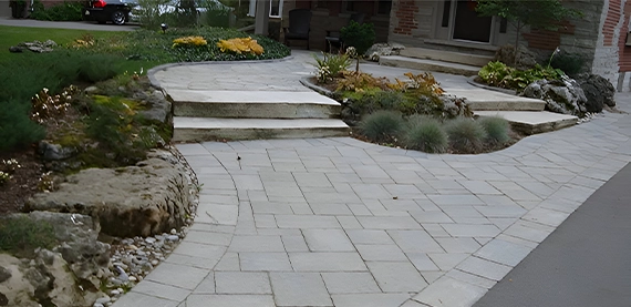 interlocking walkway with two way steps toward building