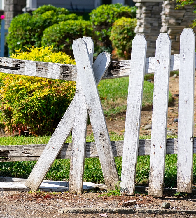 old damage wooden fence in residential property