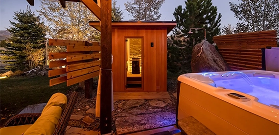 outdoor sauna and a hot tube in home backyard