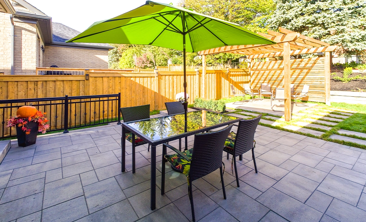 outdoor setting space on interlock patio and landscaping