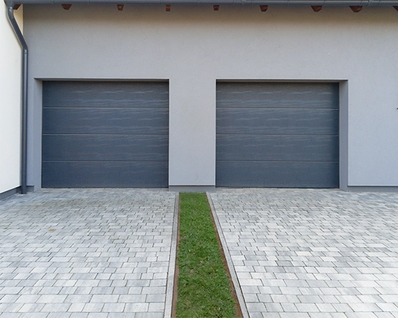 garage doors and front permeable driveway