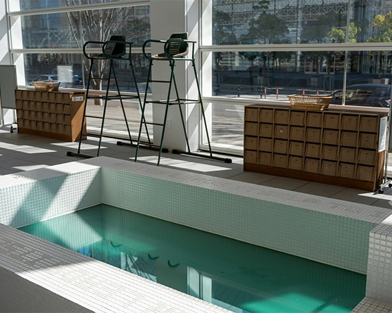 plunge pool with white tiles in indoor space