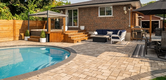 pool deck image four interlocking surface in backyard and around pool. wooden deck with plunge pool