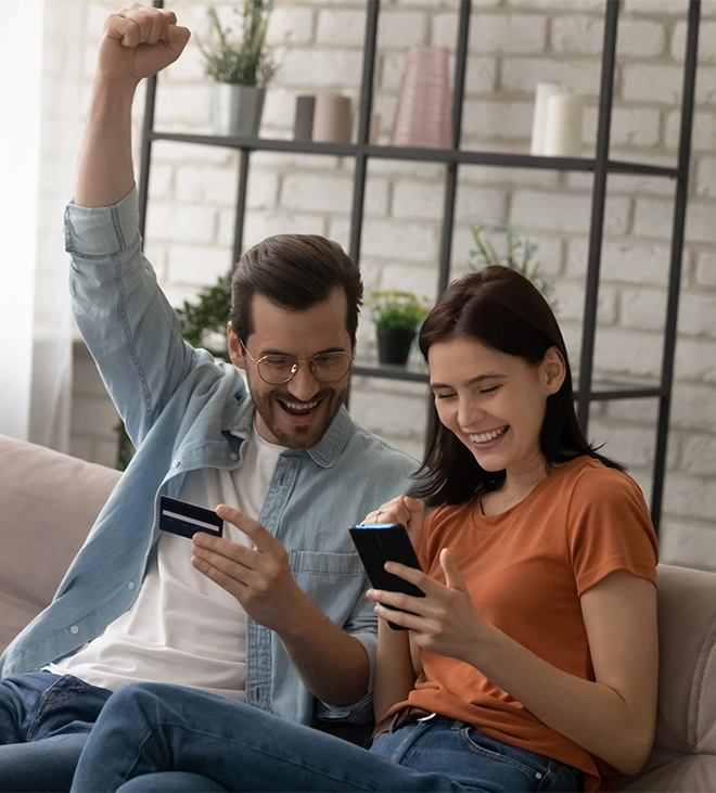 pricing flexibility happy couple, successfully pay payment via debit card online