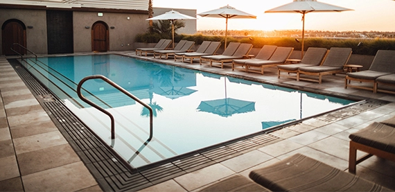 aesthetic deck and pool coping around salt water pool