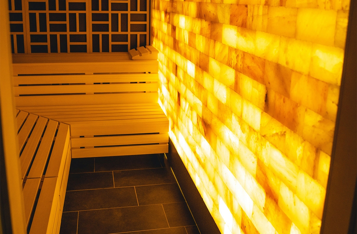 outdoor saunas heat and light feature for relaxing in front of sitting bench