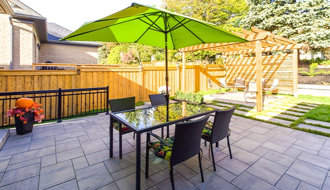 seating area on interlocking patio. landscaping, cabana