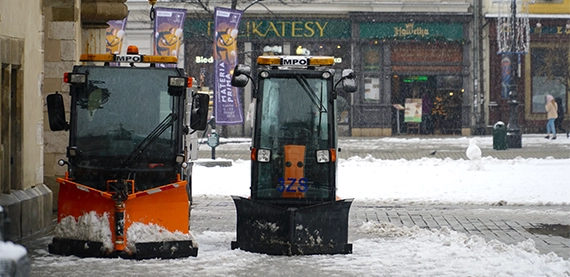 snow removal image two snow removal tractors