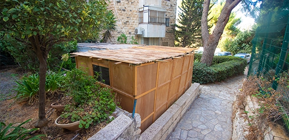 sukkah setup sukkah setup and stone work on floor, street view