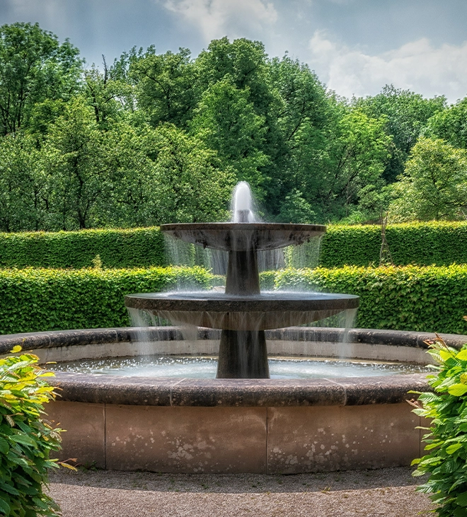 water fountain in centre of beautiful garden