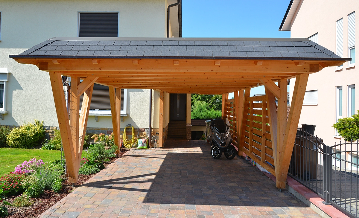wooden carport in front of a residential building New wooden Carport in Front of a residential Building