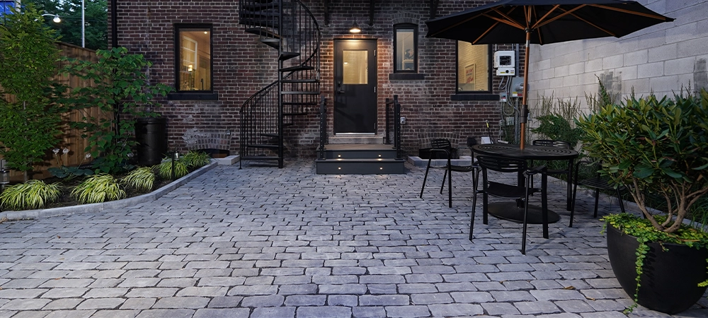 beautiful backyard, seating area with landscaping, night view