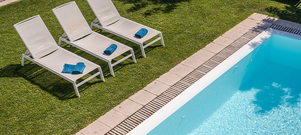 Modern house with garden swimming pool and wooden pergula