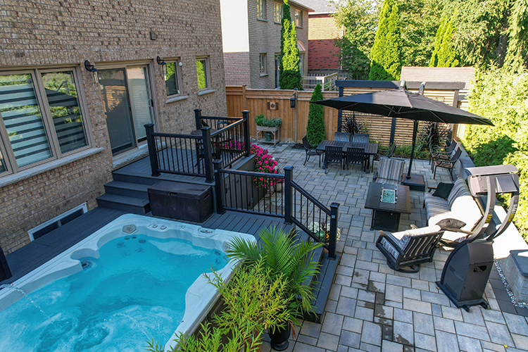 permits-page backyard with hot tub on a deck