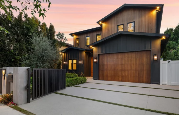 Stylish two story home with modern finishes, sunset views, pool, open living, luxe bathrooms, chef kitchen, and expansive closets