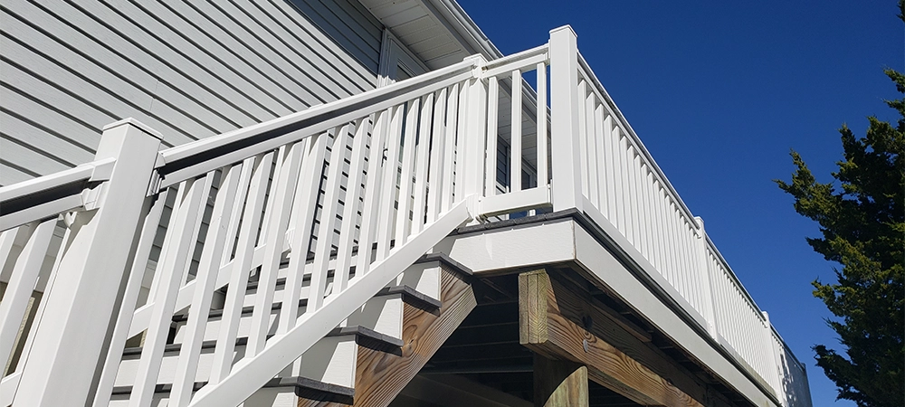 white vinyl staircase and deck railing